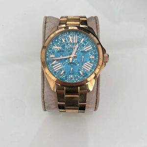 Blue fossil watch with rosegold metal